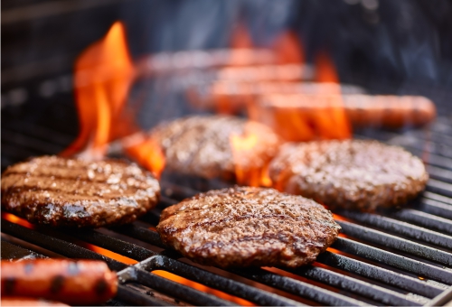 Burger Patties auf dem Grill Burger Patties auf dem Grill
