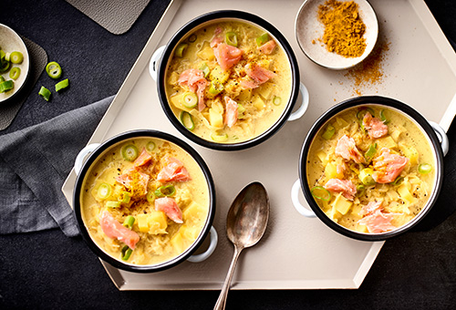 Eintopf mit Curry, Lachs und Sauerkraut